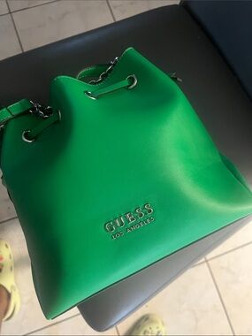 GUESS Los Angeles Bright Green Drawstring Bucket Bag